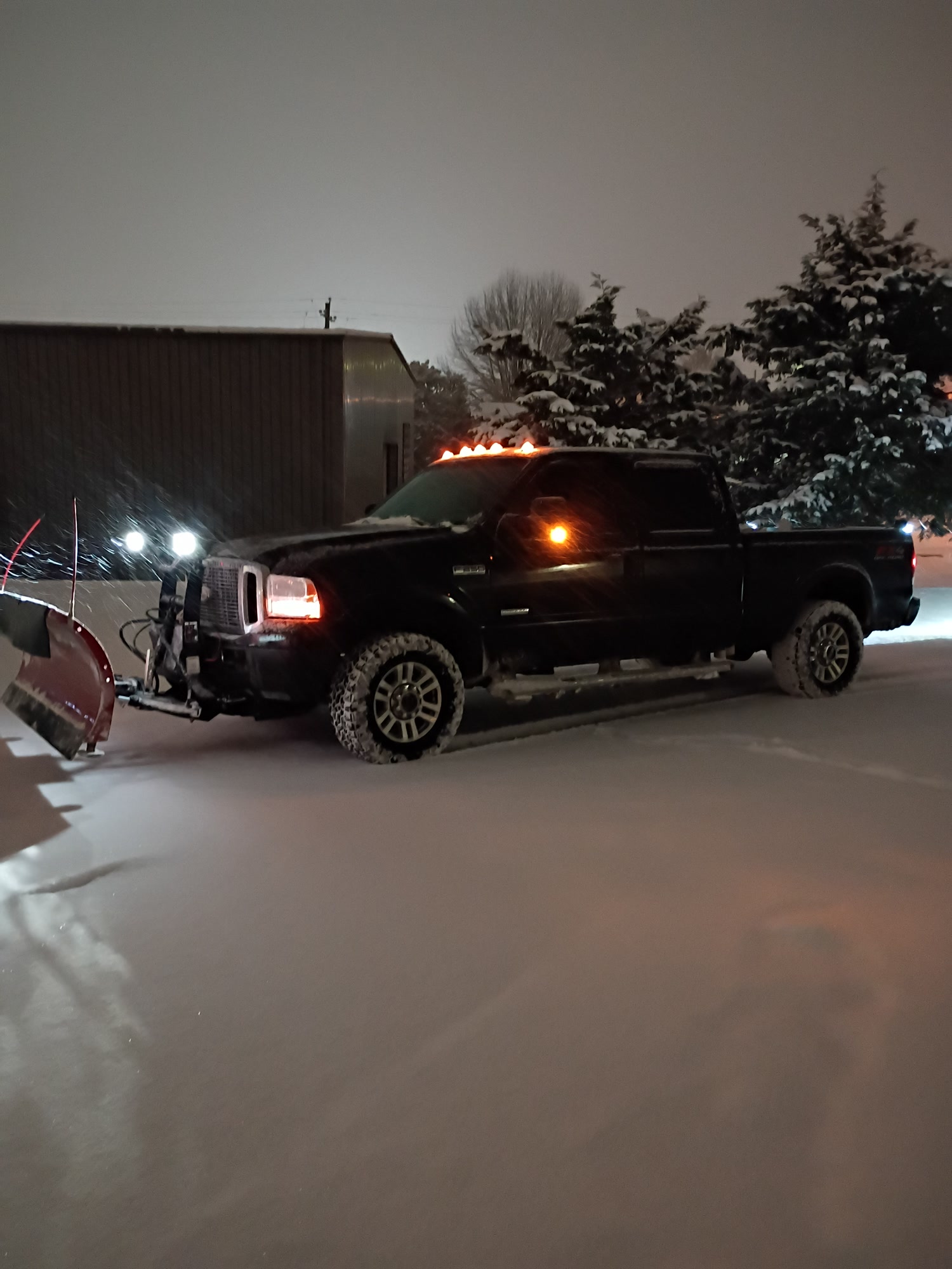 Worsham's snow plow truck ready for nighttime snow removal